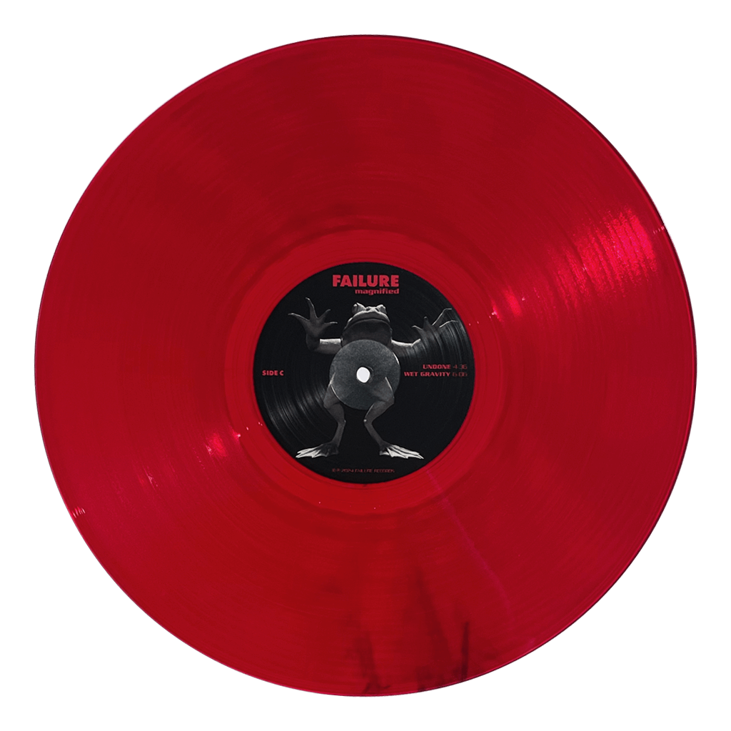 Magnified - 12" Clear Red Double Vinyl